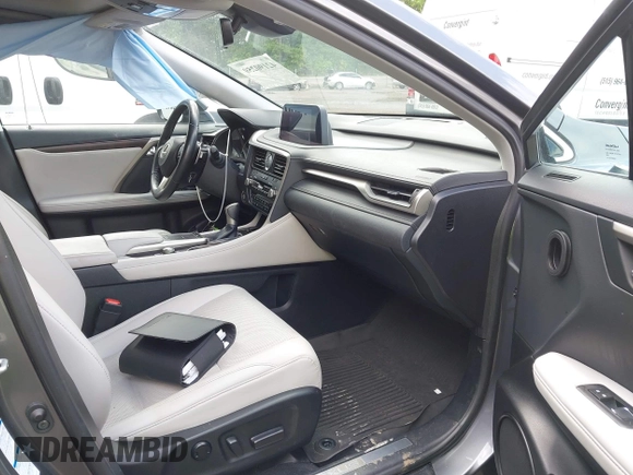 2022 Lexus RX 350 z VIN 2T2HZMDA8NC313731, wystawiony jako IAAI lot #42190259 z przebiegiem 144 177 mil mil oraz . Historia ofert i sprzedaży dostępna na DreamBid. Obrazek 5.