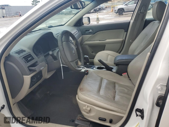 2010 Ford Fusion Hybrid z VIN 3FADP0L34AR186085, wystawiony jako Copart lot #55291735 z przebiegiem 282 029 mil mil oraz Szkody całkowita. Historia ofert i sprzedaży dostępna na DreamBid. Obrazek 7.
