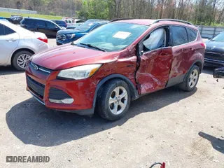 2014 Ford Escape SE with VIN 1FMCU0GX0EUB54675, listed as a IAAI auction lot 41865057 with 145,632 mi miles. Bid and sale history available at carsss.com. Image 2.