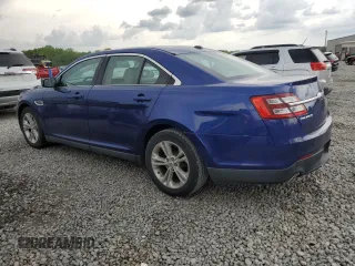 2015 Ford Taurus SE with VIN 1FAHP2D82FG152037, listed as a Copart auction lot 54142515 with 121,427 mi miles and Clean Title. Bid and sale history available at carsss.com. Image 2.