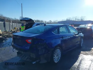 2016 Ford Fusion SE Hybrid with VIN 3FA6P0LU0GR388187, listed as a IAAI auction lot 38604646 with 135,625 mi miles. Bid and sale history available at carsss.com. Image 4.