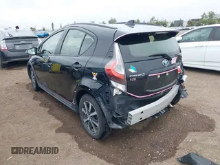 2018 Toyota Prius One z VIN JTDKDTB3XJ1606505, wystawiony jako IAAI lot #42425652 z przebiegiem 148 399 mil mil oraz . Historia ofert i sprzedaży dostępna na DreamBid. Obrazek 3.
