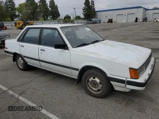 1984 Toyota Camry z VIN JT2SV16E3E0220882, wystawiony jako Copart lot #53514345 z przebiegiem 112 430 mil mil oraz Czysty tytuł • Clean title. Historia ofert i sprzedaży dostępna na DreamBid. Obrazek 4.