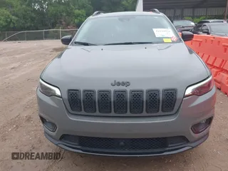 2023 Jeep Cherokee Altitude Lux with VIN 1C4PJMMB5PD114674, listed as a IAAI auction lot 42129076 with 54,269 mi miles. Bid and sale history available at carsss.com. Image 12.