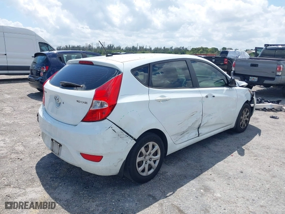 2013 Hyundai Accent GL with VIN KMHCT5AE1DU092600, listed as a IAAI auction lot 41901615 with 126,327 mi miles. Bid and sale history available at carsss.com. Image 4.