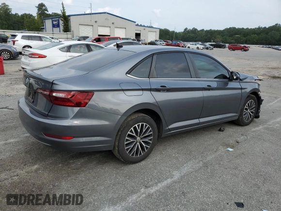 2021 Volkswagen Jetta S с VIN 3VWC57BUXMM042652, выставлен на аукционе Copart как лот 57286905 с пробегом 126 637 миль миль и Списание • Salvage title. История ставок и продаж доступна на DreamBid. Изображение 3.