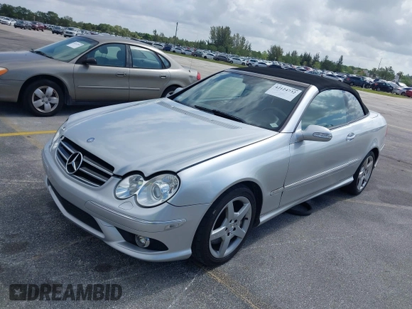 2007 Mercedes-Benz CLK 550 with VIN WDBTK72F37F222068, listed as a IAAI auction lot 42124732 with 169,442 mi miles and . Bid and sale history available at carsss.com. Image 2.