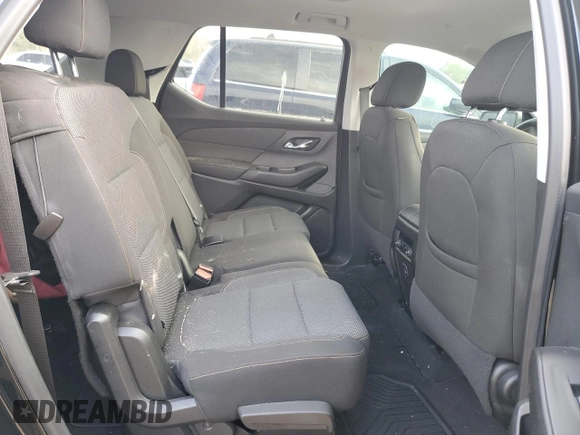 2020 Chevrolet Traverse LS z VIN 1GNERFKW7LJ313830, wystawiony jako Copart lot #51743465 z przebiegiem 56 874 mil mil oraz Szkoda całkowita • Salvage title. Historia ofert i sprzedaży dostępna na DreamBid. Obrazek 11.