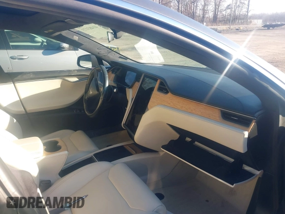 2019 Tesla Model S 75D with VIN 5YJSA1E2XKF331744, listed as a IAAI auction lot 41483173 with Not provided miles and . Bid and sale history available at DreamBid. Image 5.