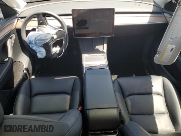 2024 Tesla Model Y с VIN 7SAYGDED5RF177307, выставлен на аукционе Copart как лот 57170315 с пробегом 14 726 миль миль и Списание • Salvage title. История ставок и продаж доступна на DreamBid. Изображение 8.