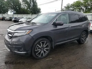 2020 Honda Pilot Touring 7-Passenger z VIN 5FNYF6H68LB052379, wystawiony jako Copart lot #57655775 z przebiegiem 73 501 mil mil oraz Szkoda całkowita • Salvage title. Historia ofert i sprzedaży dostępna na DreamBid. Obrazek 1.