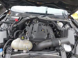 2020 Ford Mustang EcoBoost z VIN 1FATP8UH7L5131625, wystawiony jako IAAI lot #42295906 z przebiegiem 74 572 mil mil oraz . Historia ofert i sprzedaży dostępna na DreamBid. Obrazek 10.