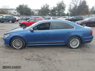 2016 Volkswagen Passat 1.8T SE w/Technology with VIN 1VWBS7A32GC018266, listed as a IAAI auction lot 41425924 with 129,809 mi miles. Bid and sale history available at carsss.com. Image 14.