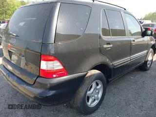 2004 Mercedes-Benz M 350 with VIN 4JGAB57E24A468675, listed as a IAAI auction lot 42056078 with 197,169 mi miles and . Bid and sale history available at DreamBid. Image 4.
