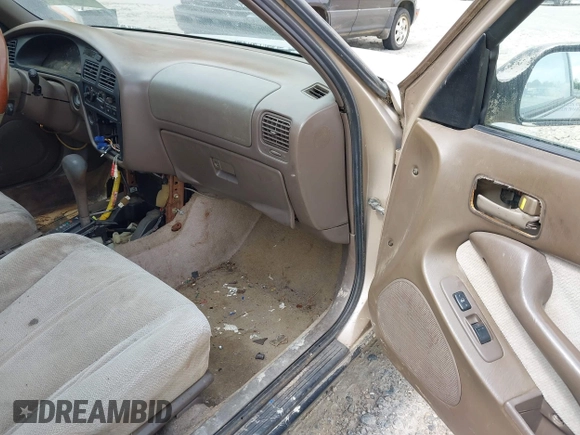 1996 Toyota Camry DX z VIN 4T1BG12K6TU752299, wystawiony jako IAAI lot #42239717 z przebiegiem 365 814 mil mil oraz . Historia ofert i sprzedaży dostępna na DreamBid. Obrazek 5.