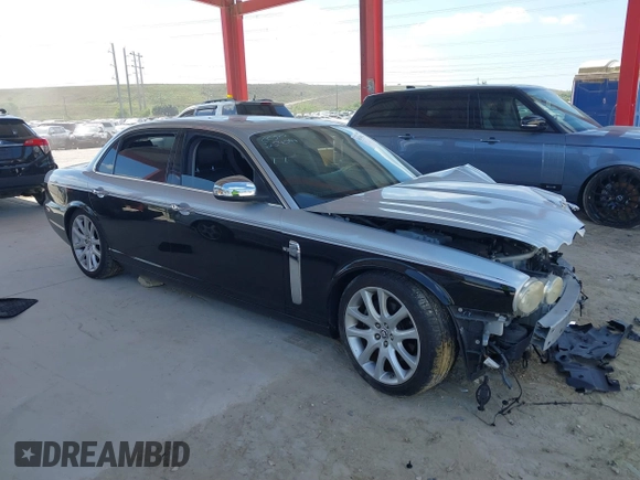2008 Jaguar XJ with VIN SAJWA79B48SH22788, listed as a IAAI auction lot 41530902 with 124,334 mi miles. Bid and sale history available at carsss.com. Image 13.