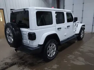 2018 Jeep Wrangler Unlimited Sahara z VIN 1C4HJXEG3JW117990, wystawiony jako IAAI lot #42290861 z przebiegiem 86 907 mil mil oraz . Historia ofert i sprzedaży dostępna na DreamBid. Obrazek 4.