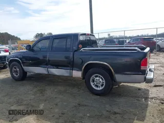 2000 Dodge Dakota Sport with VIN 1B7GL2AX8YS790208, listed as a IAAI auction lot 41613640 with 365,198 mi miles and . Bid and sale history available at DreamBid. Image 14.