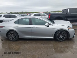 2022 Toyota Camry SE with VIN 4T1G11AKXNU697576, listed as a IAAI auction lot 41947082 with 67,199 mi miles and . Bid and sale history available at DreamBid. Image 13.