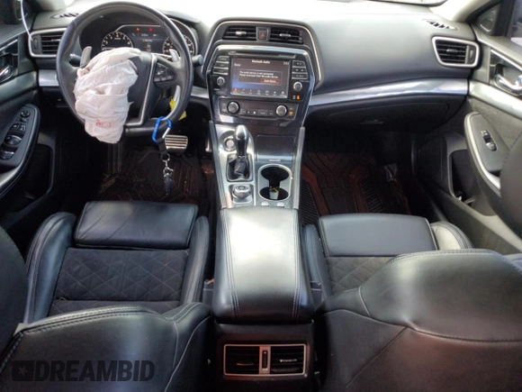 2016 Nissan Maxima SR z VIN 1N4AA6APXGC439401, wystawiony jako Copart lot #52011535 z przebiegiem 132 267 mil mil oraz Szkoda całkowita • Salvage title. Historia ofert i sprzedaży dostępna na DreamBid. Obrazek 8.