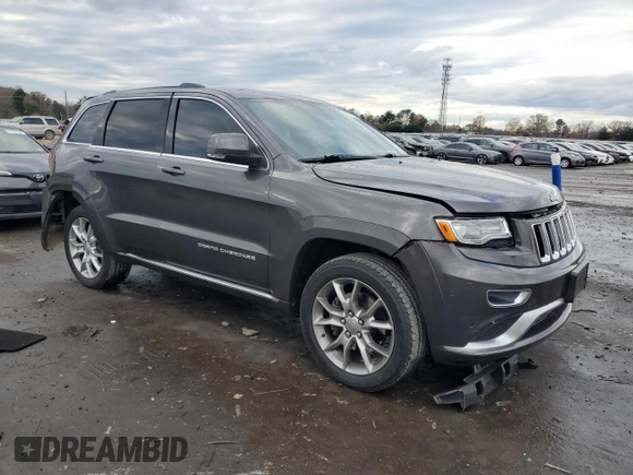 2015 Jeep Grand Cherokee Summit with VIN 1C4RJFJM7FC928257, listed as a Copart auction lot 82525714 with 148,208 mi miles and Salvage Title. Bid and sale history available at carsss.com. Image 4.