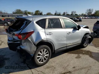 2016 Mazda CX-5 Touring with VIN JM3KE2CY8G0614335, listed as a Copart auction lot 52124465 with 218,320 mi miles and Salvage Title. Bid and sale history available at carsss.com. Image 3.