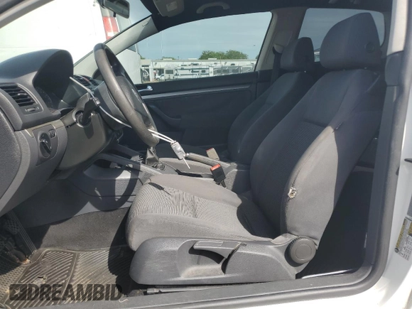 2009 Volkswagen Rabbit S with VIN WVWAB71K99W143367, listed as a Copart auction lot 52926345 with 175,584 mi miles and Salvage title. Bid and sale history available at DreamBid. Image 7.