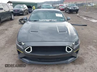 2018 Ford Mustang GT z VIN 1FA6P8CF9J5179766, wystawiony jako IAAI lot #41977000 z przebiegiem 83 608 mil mil oraz . Historia ofert i sprzedaży dostępna na DreamBid. Obrazek 13.
