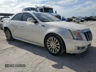 2012 Cadillac CTS Performance with VIN 1G6DJ5E3XC0157881, listed as a Copart auction lot 86434934 with 60,943 mi miles and Salvage Title. Bid and sale history available at DreamBid. Image 4.