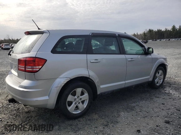 2013 Dodge Journey American Value z VIN 3C4PDCABXDT621551, wystawiony jako Copart lot #52523675 z przebiegiem 123 348 mil mil oraz Szkoda całkowita • Salvage title. Historia ofert i sprzedaży dostępna na DreamBid. Obrazek 3.