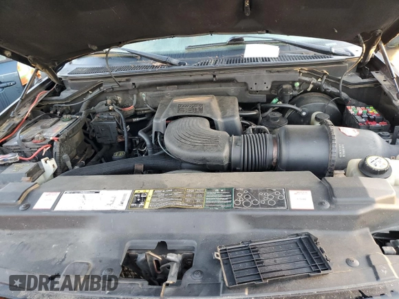 2002 Ford F-150 XL with VIN 2FTRX08L72CA44252, listed as a Copart auction lot 77344214 with 255,001 mi miles and Clean title. Bid and sale history available at DreamBid. Image 11.