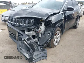 2018 Jeep Compass Altitude with VIN 3C4NJDBB0JT484409, listed as a IAAI auction lot 41656179 with 85,436 mi miles and . Bid and sale history available at carsss.com. Image 6.