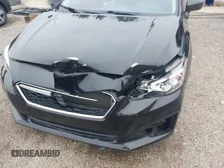 2019 Subaru Impreza with VIN 4S3GTAA62K3743520, listed as a IAAI auction lot 42485321 with 75,736 mi miles and . Bid and sale history available at DreamBid. Image 6.