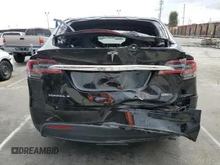2018 Tesla Model X 75D with VIN 5YJXCBE24JF130216, listed as a Copart auction lot 48894215 with 75,694 mi miles and Salvage Title. Bid and sale history available at carsss.com. Image 6.