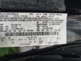 2013 Ford Focus SE z VIN 1FADP3F28DL232167, wystawiony jako IAAI lot #42551700 z przebiegiem 190 117 mil mil oraz . Historia ofert i sprzedaży dostępna na DreamBid. Obrazek 9.