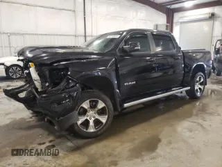 2023 Ram 1500 Laramie with VIN 1C6SRFJT1PN600265, listed as a Copart auction lot 59743324 with 23,101 mi miles and Salvage title. Bid and sale history available at DreamBid. Image 1.