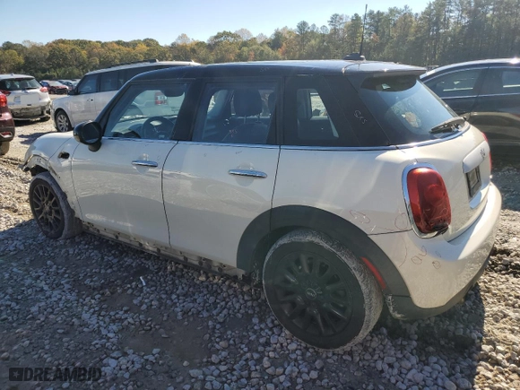 2015 MINI Cooper Hardtop 4 Door with VIN WMWXS5C5XFT830535, listed as a Copart auction lot 80746434 with 139,945 mi miles and Salvage Title. Bid and sale history available at carsss.com. Image 2.