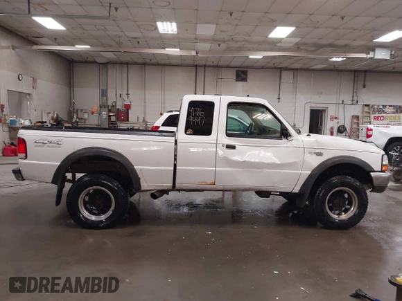 2000 Ford Ranger XLT with VIN 1FTZR15X4YPA57023, listed as a IAAI auction lot 41769447 with 159,655 mi miles and . Bid and sale history available at DreamBid. Image 14.