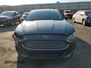 2016 Ford Fusion SE Hybrid z VIN 3FA6P0LU2GR342876, wystawiony jako Copart lot #65036385 z przebiegiem 118 832 mil mil oraz Czysty tytuł • Clean title. Historia ofert i sprzedaży dostępna na DreamBid. Obrazek 5.