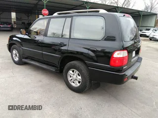 2000 Lexus LX 470 with VIN JT6HT00W8Y0100087, listed as a IAAI auction lot 41762294 with 274,720 mi miles and . Bid and sale history available at carsss.com. Image 3.