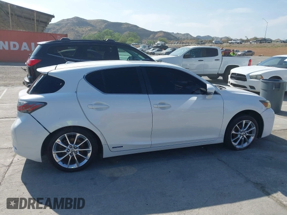 2011 Lexus CT 200h with VIN JTHKD5BH2B2015893, listed as a IAAI auction lot 42095735 with 124,619 mi miles and . Bid and sale history available at DreamBid. Image 13.