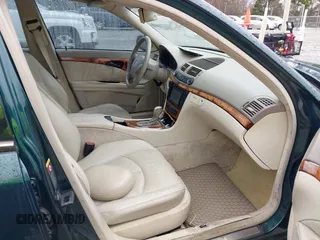 2003 Mercedes-Benz E 320 with VIN WDBUF65J73A130214, listed as a IAAI auction lot 41731642 with 203,520 mi miles and . Bid and sale history available at carsss.com. Image 5.