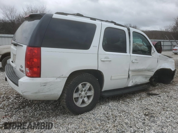 2012 GMC Yukon SLT with VIN 1GKS2CE09CR122728, listed as a Copart auction lot 87093604 with 124,739 mi miles and Salvage Title. Bid and sale history available at carsss.com. Image 3.
