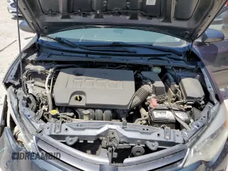 2016 Toyota Corolla L z VIN 5YFBURHE4GP370790, wystawiony jako Copart lot #56833045 z przebiegiem 137 525 mil mil oraz Szkoda całkowita • Salvage title. Historia ofert i sprzedaży dostępna na DreamBid. Obrazek 11.