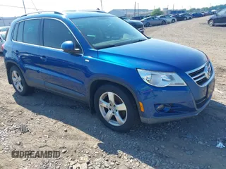 2010 Volkswagen Tiguan S with VIN WVGBV7AX9AW002290, listed as a IAAI auction lot 42733168 with 125,776 mi miles and . Bid and sale history available at DreamBid. Image 1.