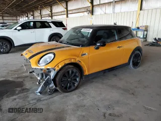 2014 MINI Hardtop S with VIN WMWXM7C58ET731653, listed as a Copart auction lot 59330445 with 95,906 mi miles and Salvage title. Bid and sale history available at DreamBid. Image 1.