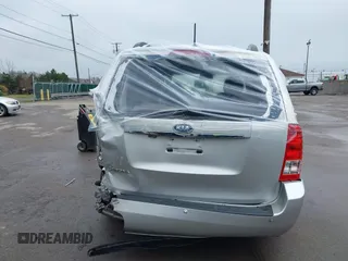 2012 Kia Sedona LX with VIN KNDMG4C72C6485952, listed as a IAAI auction lot 42029147 with 129,296 mi miles. Bid and sale history available at carsss.com. Image 16.