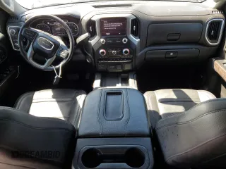 2022 GMC Sierra 1500 Denali with VIN 3GTU9FEDXNG213711, listed as a Copart auction lot 64112245 with 63,476 mi miles and Salvage title. Bid and sale history available at DreamBid. Image 8.