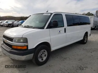 2014 Chevrolet Express Passenger LT with VIN 1GAZG1FG2E1202457, listed as a Copart auction lot 82704884 with 142,982 mi miles and Salvage title. Bid and sale history available at DreamBid. Image 1.