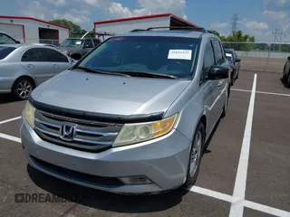 2011 Honda Odyssey Touring with VIN 5FNRL5H99BB058448, listed as a IAAI auction lot 42651432 with 208,581 mi miles and . Bid and sale history available at DreamBid. Image 17.